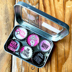 Nasty Woman - 6 unique bottle cap magnet set in tin.