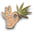 Hand holding a cannabis leaf Enamel Pin - CC