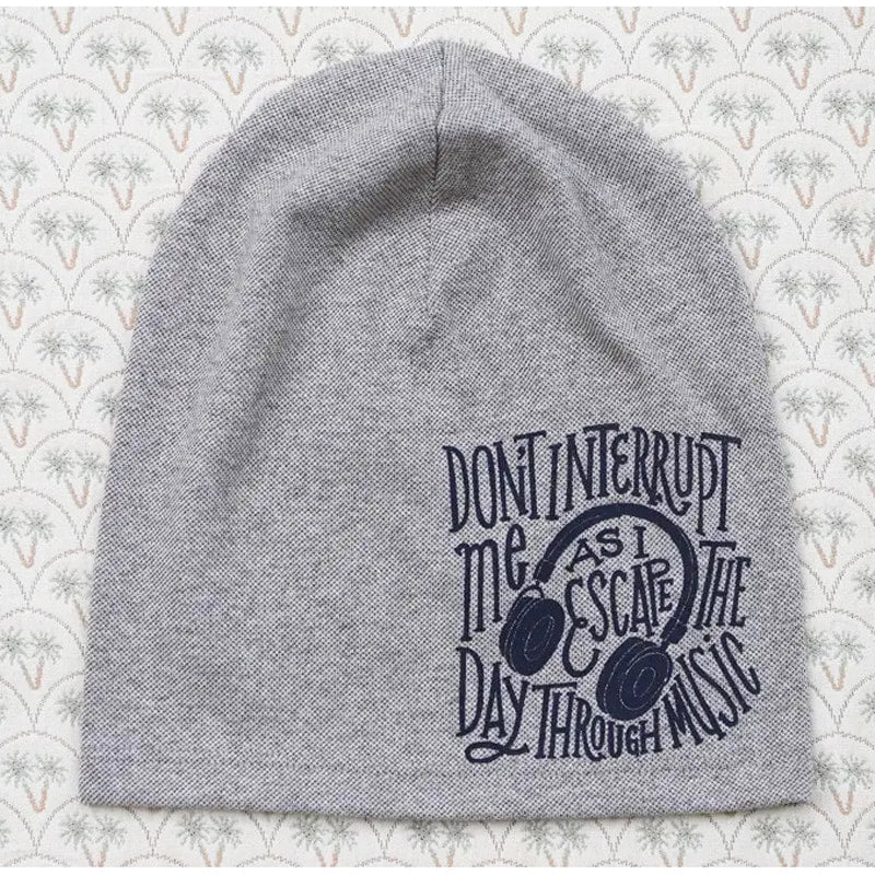 Don't Interrupt me as I escape the Day through Music - Women's beanie. FF